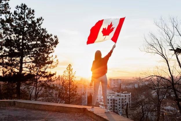 full-shot-woman-with-canadian-flag_23-2150458746